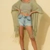 Wanderlust By Abby Fringe Knit Poncho Top 1 Wanderlust By Abby Fringe Knit Poncho Top